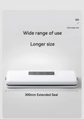 Small white automatic vacuum sealing machine for home food preservation on a kitchen counter.