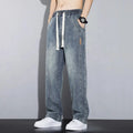 Men's loose fit straight leg cotton denim jeans with elastic waist and rope closure, available in four colours