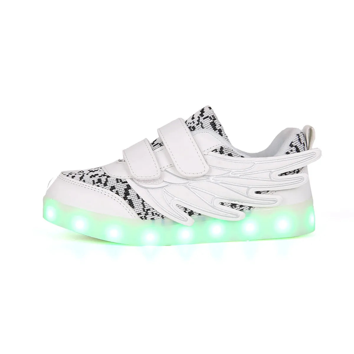 Children's plum red sneakers with colourful LED lights glowing in the soles.