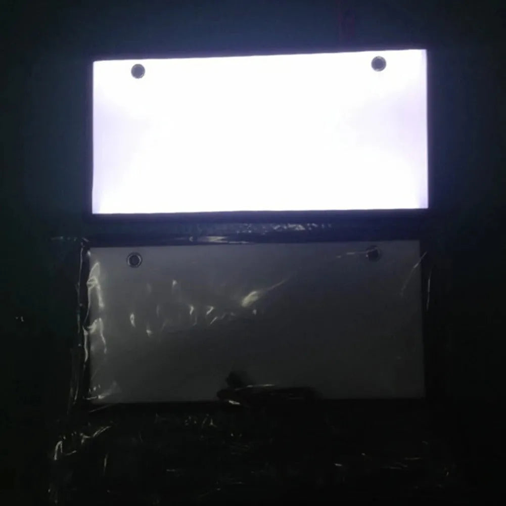 Two white LED truck licence plate light units, showing flat thin design with multiple LED beads.