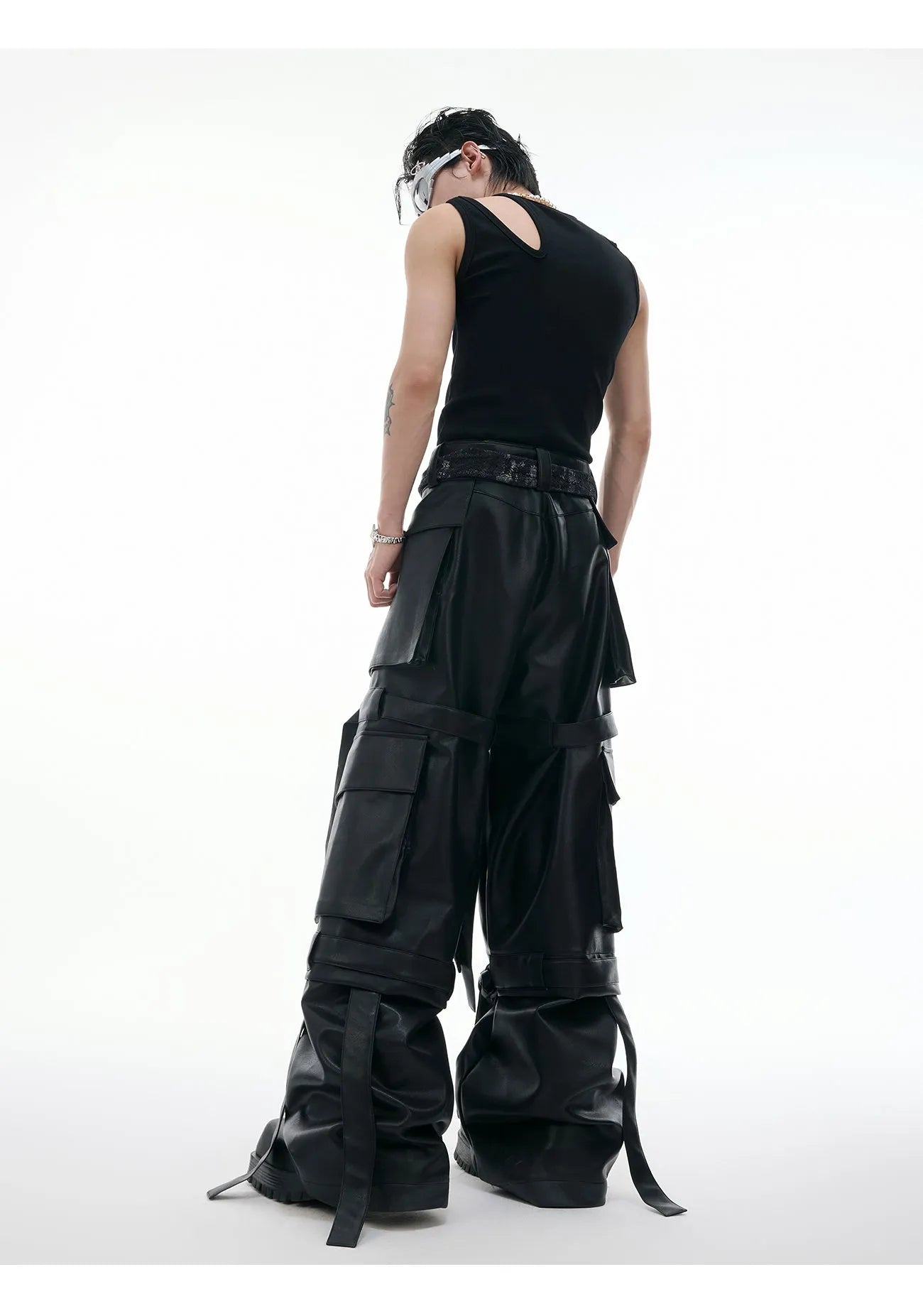Black loose-fit quilted trousers with multiple pockets and stitching detail