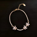 Women's quadrilateral geometric copper bracelet with zircon inlaid details and gold colour finish