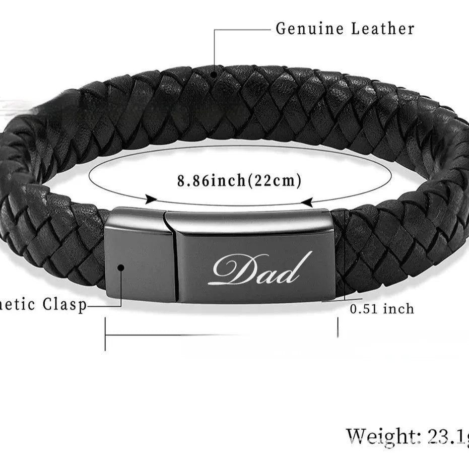 Black leather bracelet with a small stainless steel casket charm, shown in a gift box.
