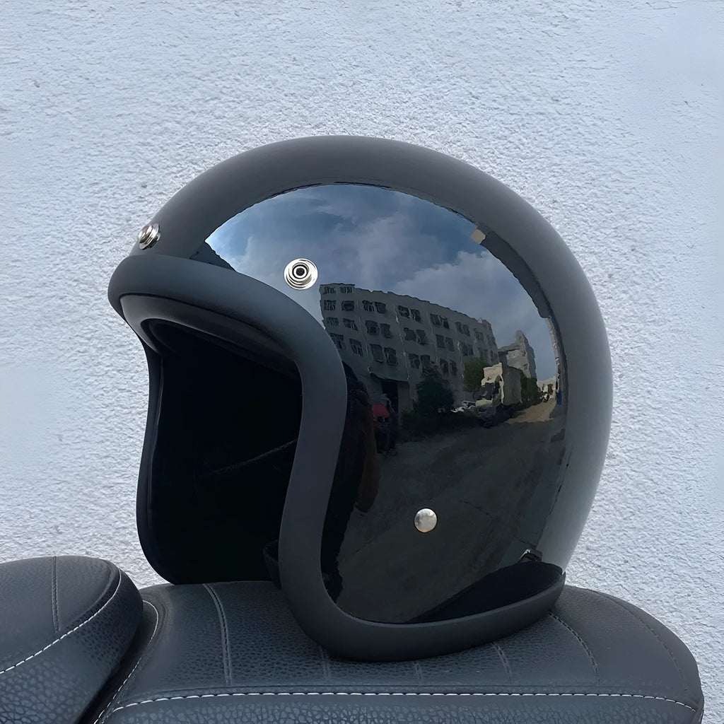 Retro style half motorcycle helmet in glass fibre construction for electric bike commuting