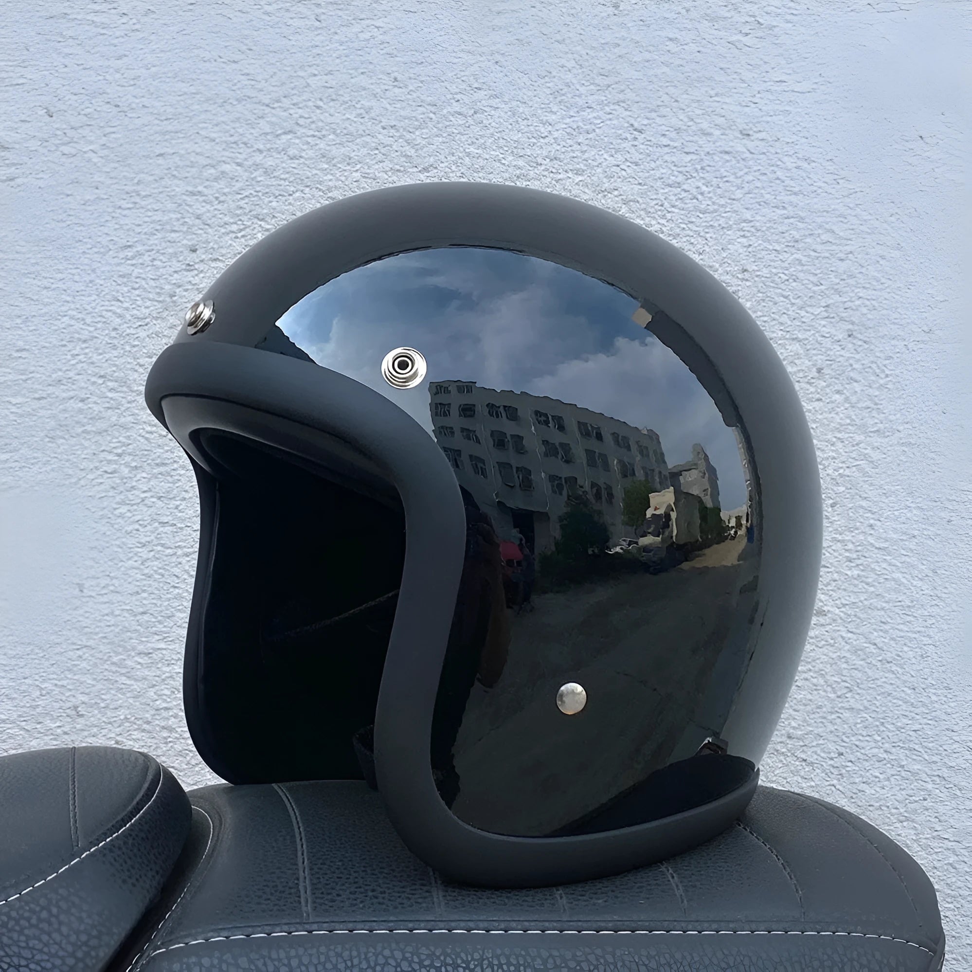 Retro style half motorcycle helmet in glass fibre construction for electric bike commuting