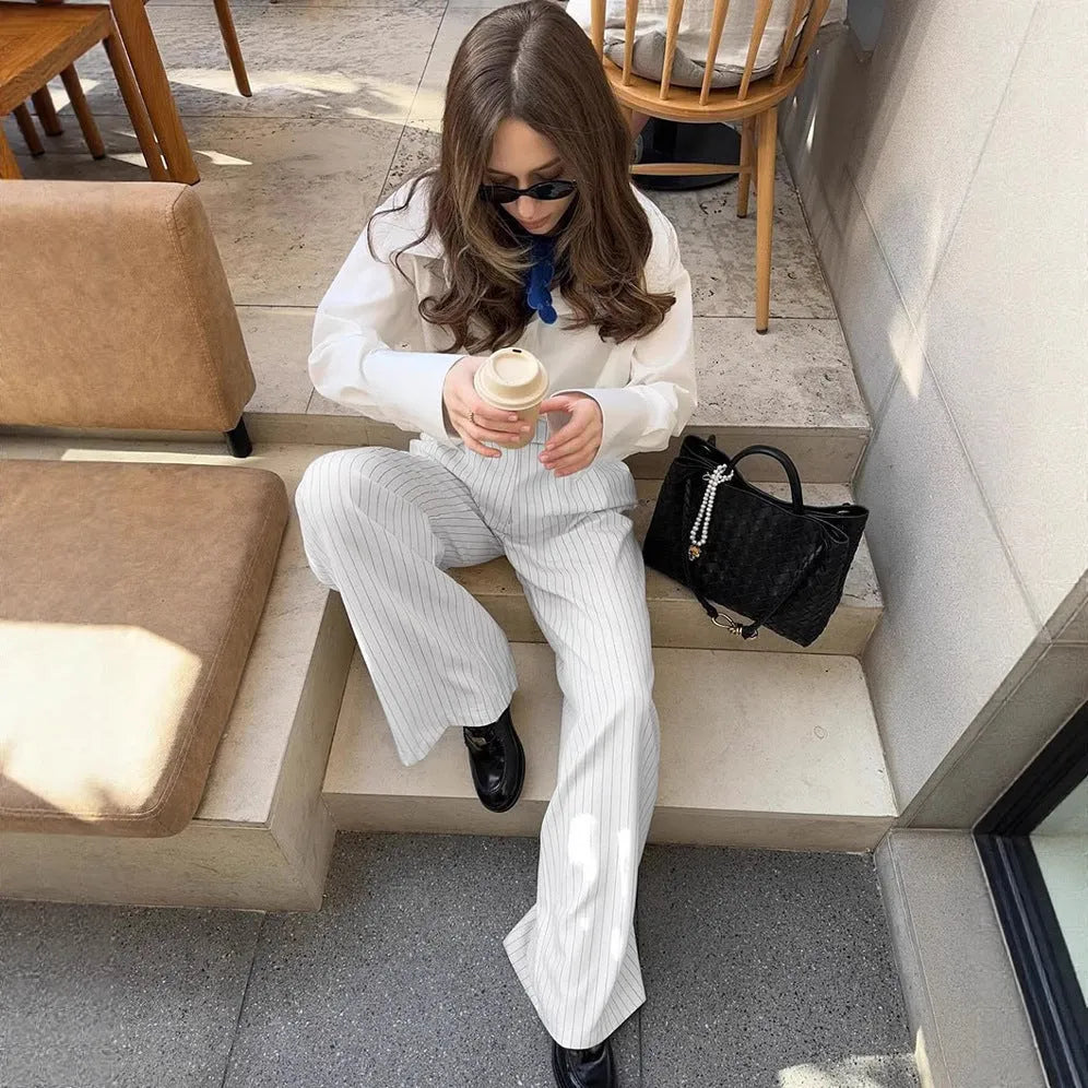 White striped wide-leg trousers with zipper details on polyester fabric for office commuting