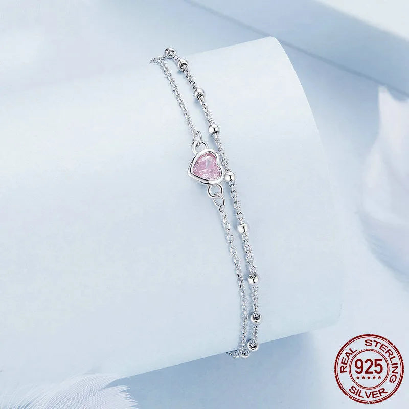 Women's 925 sterling silver bracelet with heart-shaped pendant on adjustable chain