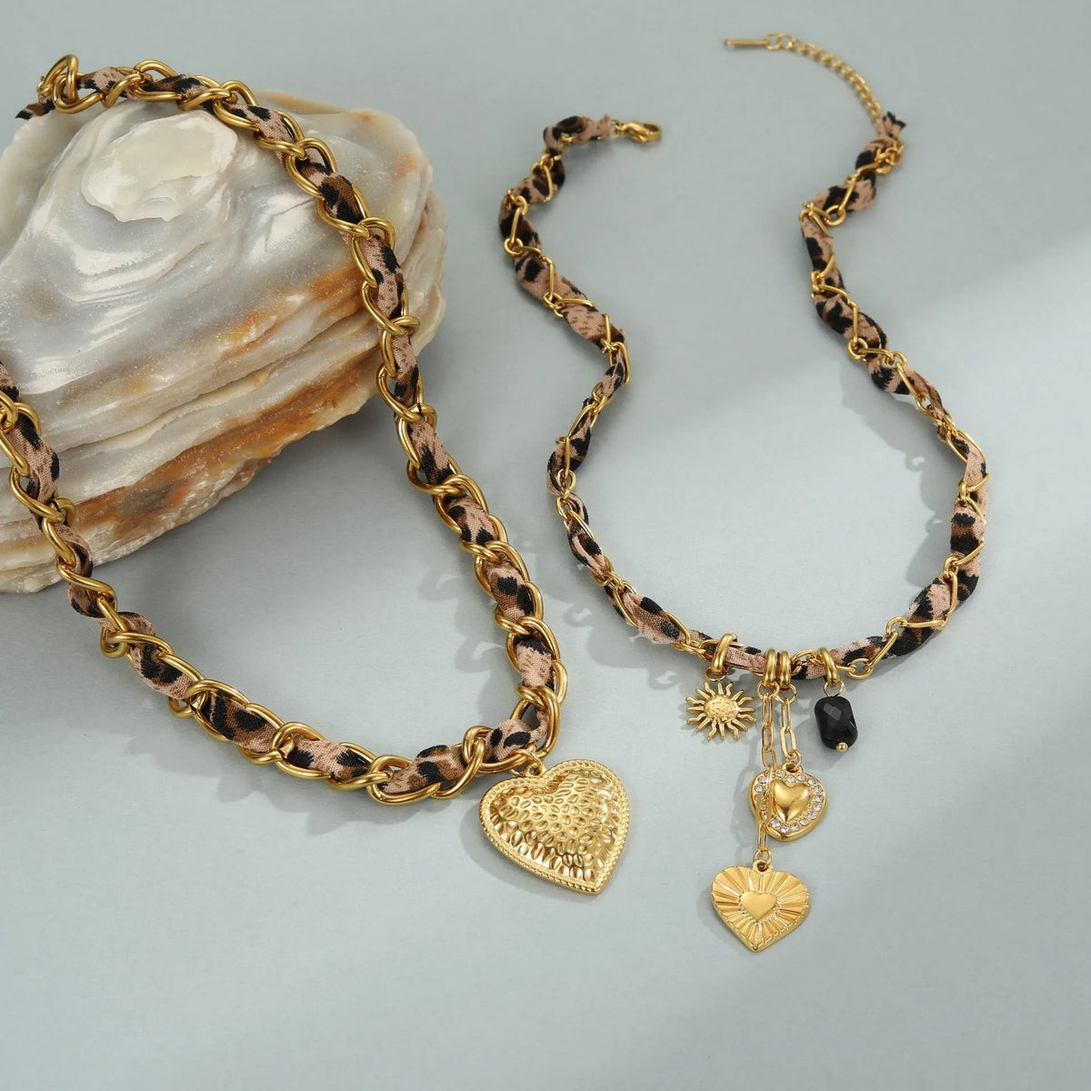 Geometric leopard love pendant stainless steel necklace with gold electroplated finish on adjustable chain