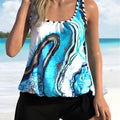 Blue tie-dyed floral pattern women's two-piece swimsuit with matching top and shorts