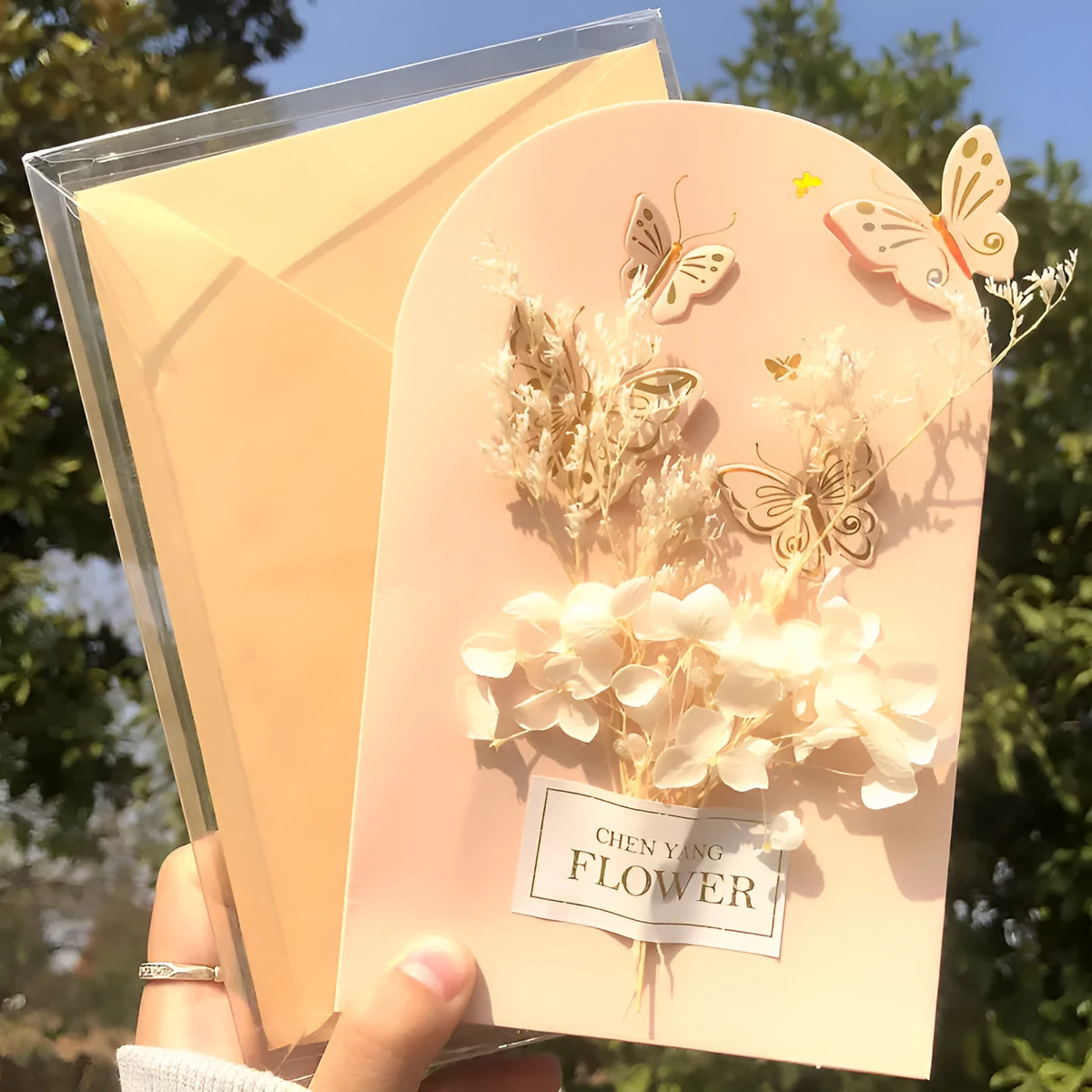 Handmade 3D butterfly shape birthday card with pop-up flowers and hot stamping details.