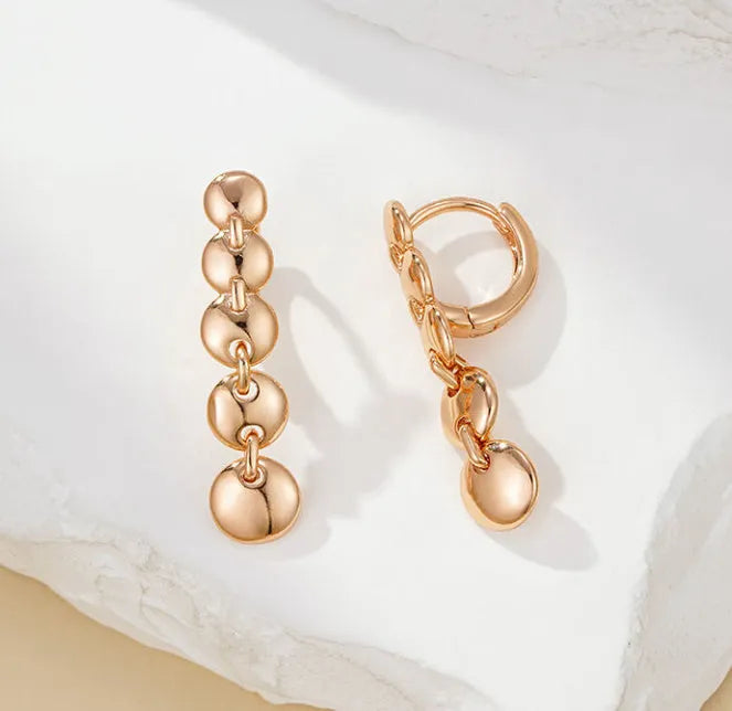 Gold retro woven copper circle earrings with round shape and long drop design