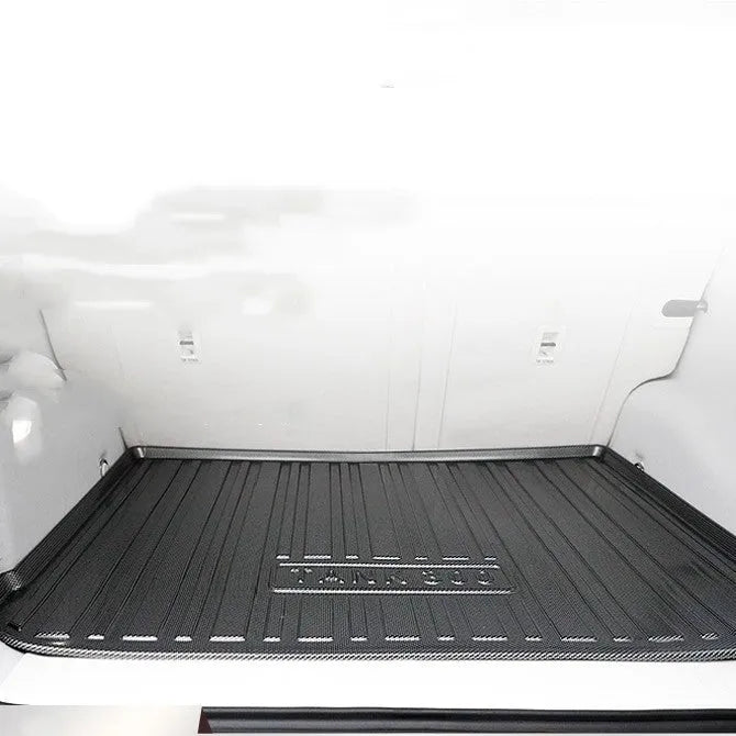 Black carbon fibre pattern car boot protector pad for vehicle cargo area