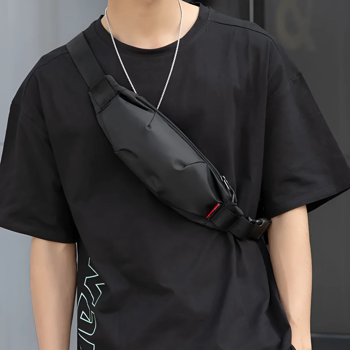Black Oxford cloth men's single shoulder crossbody bag showing phone pocket and zipper compartments