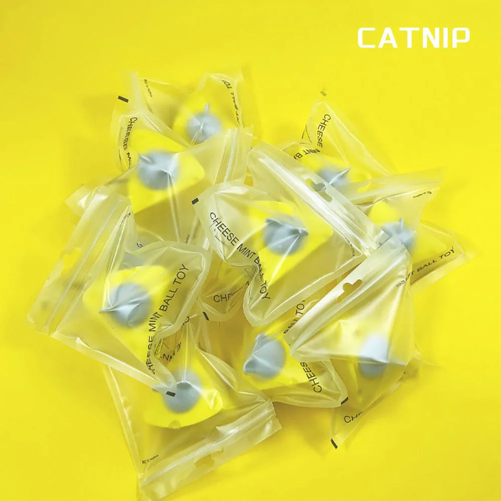 Yellow spherical catnip toy ball for cats with teeth cleaning function