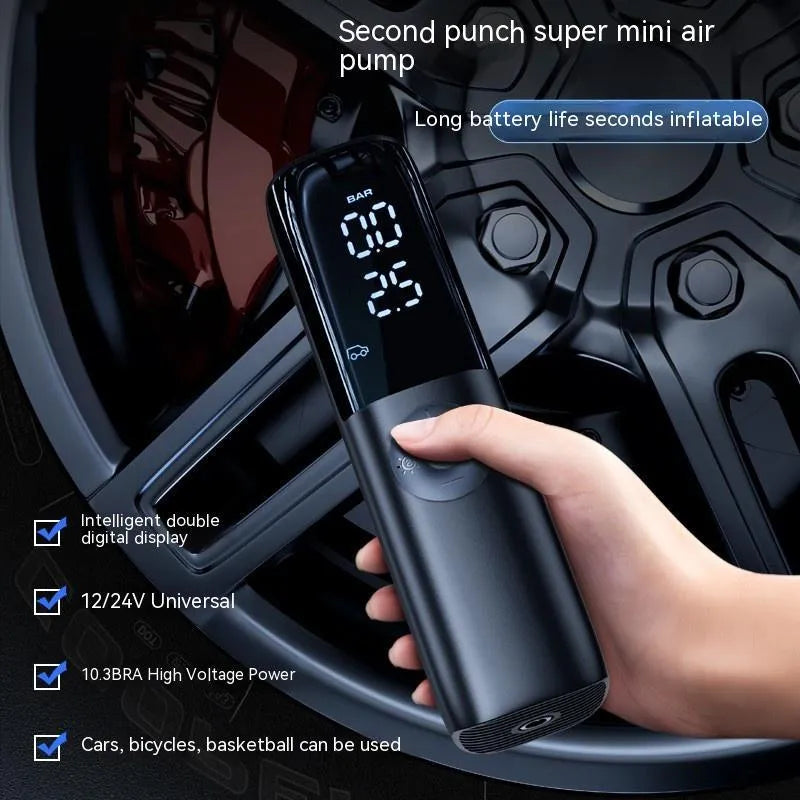 Black portable electric car air pump with pressure gauge and hose