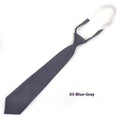 Solid colour men's cotton bow tie in arrow style laid flat, showing navy blue colour option.