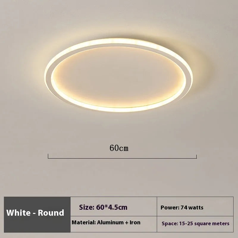 Modern minimalist black ceiling lamp with LED lights and dimming control on a bedroom ceiling.