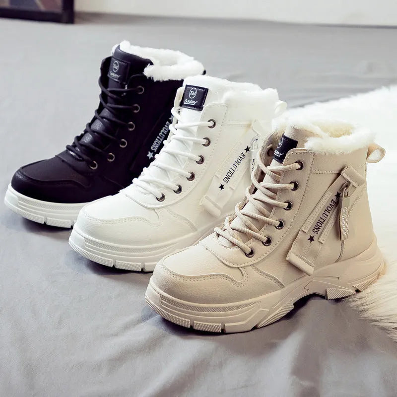 Plus size women's snow boots in black with fleece lining and lace-up front