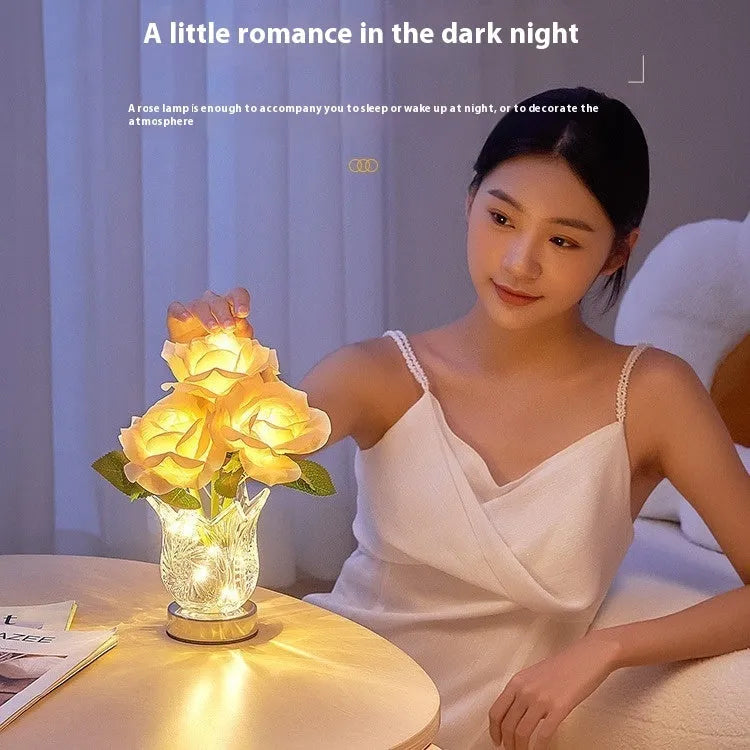 White crystal flowers touch control table lamp with USB charging cable on bedside table