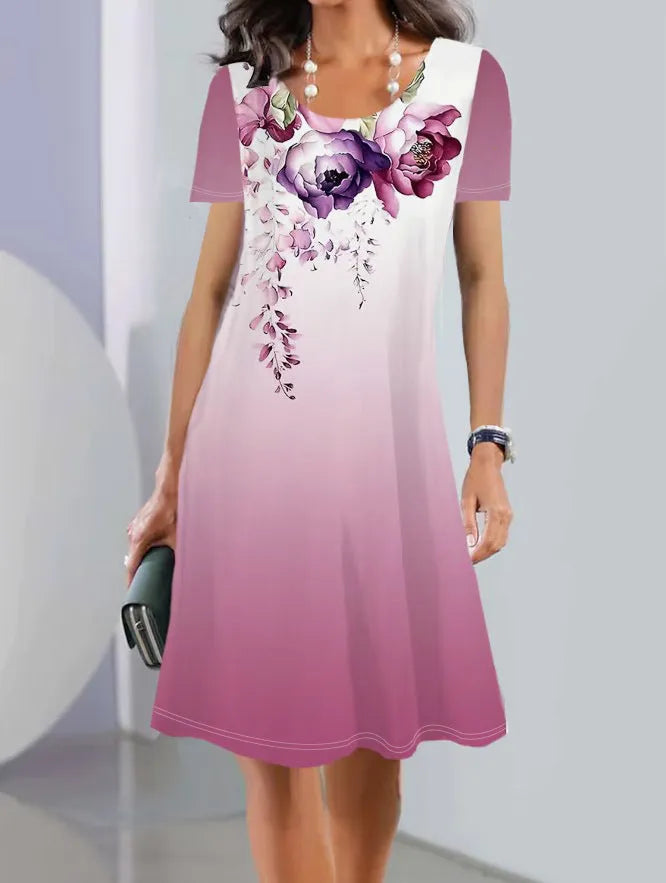Women's light blue floral print A-line midi dress with short sleeves on a hanger