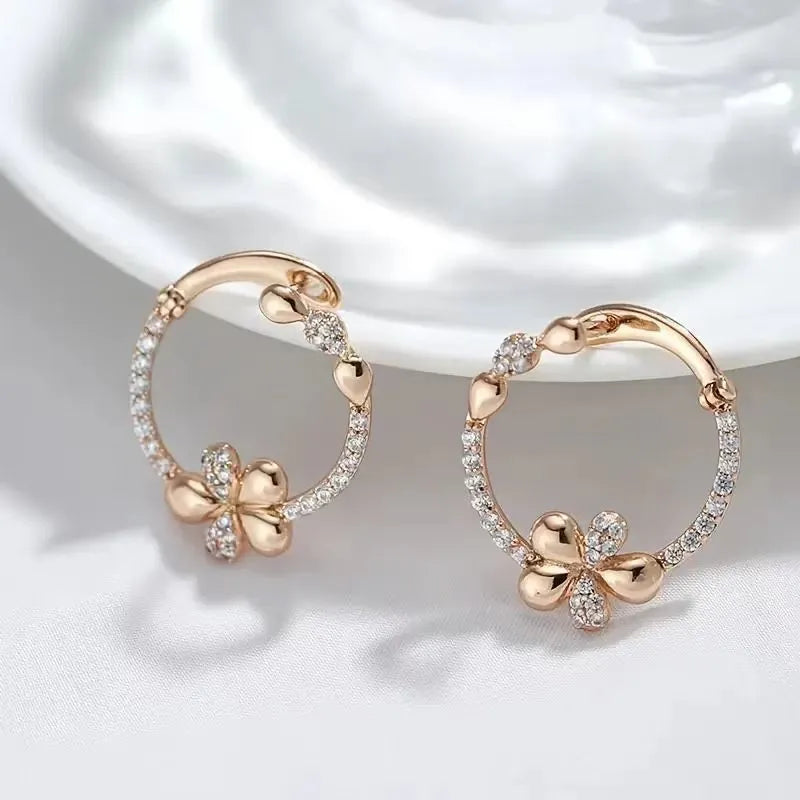 A pair of women's round silver hoop earrings made from electroplated copper.