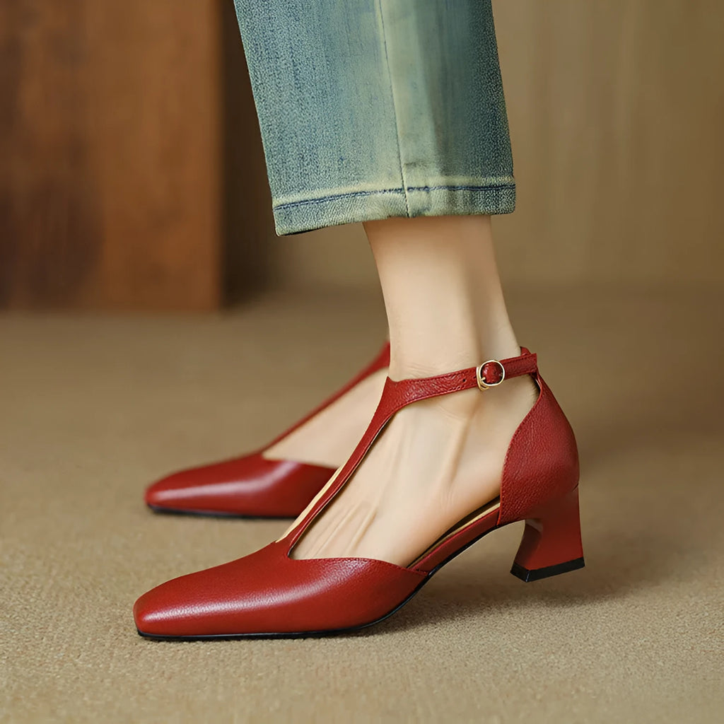 Wine red sheepskin leather square toe high heels with a chunky heel and silver buckle closure.