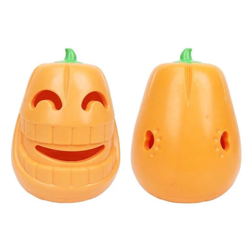 Orange Halloween pumpkin shaped interactive dog chew toy with treat dispensing funnel