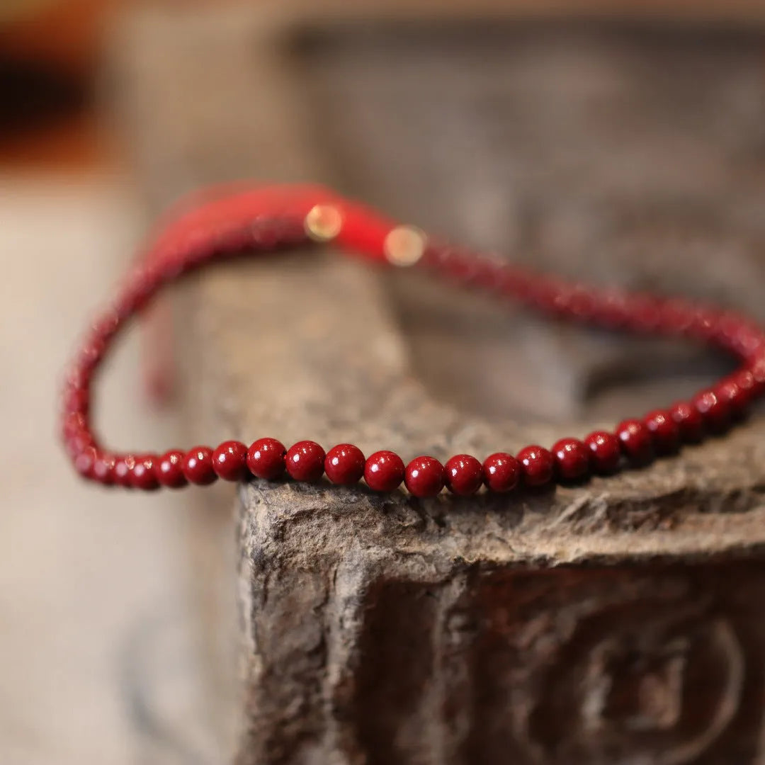 Handmade natural cinnabar bracelet with geometric auspicious patterns in purple gold sand colour
