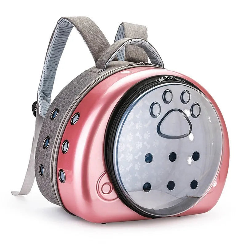 Transparent space capsule style pet carrier bag for cats in a metallic colour with a front shell cover.