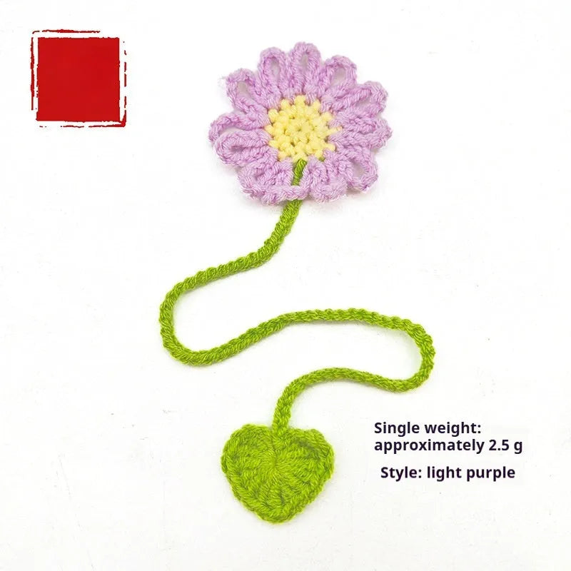 Hand-crocheted wool bookmark with daisy ornament in flexible milk cotton wire