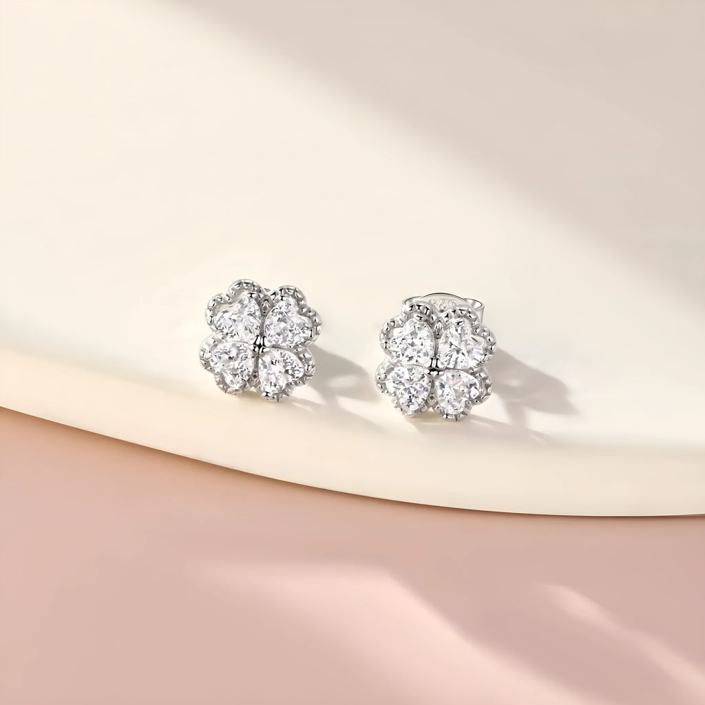 Women's heart-shaped zircon and four-leaf clover earrings in white gold coloured 925 sterling silver.