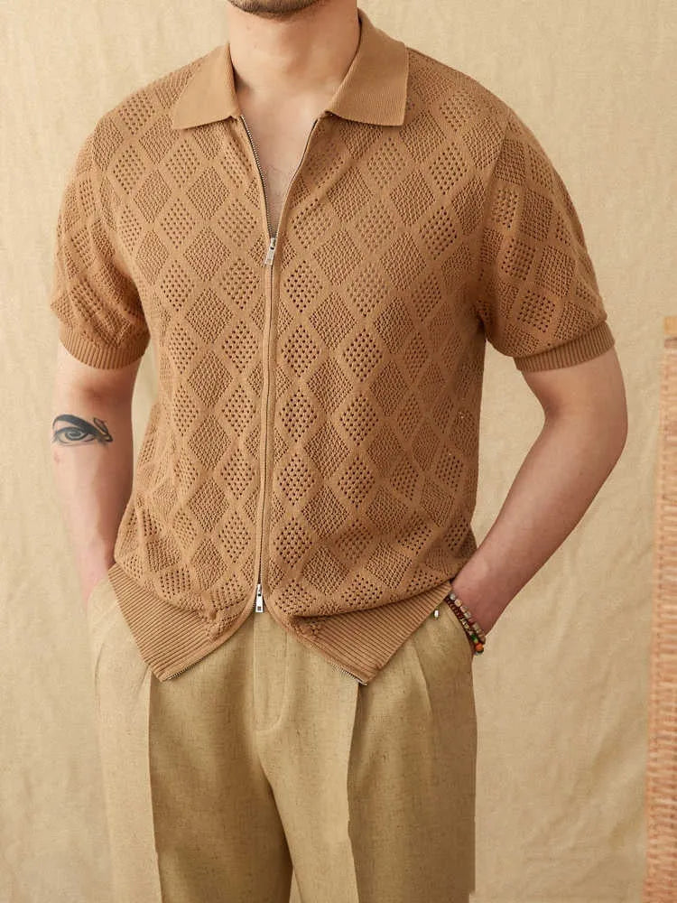 Light brown cotton cardigan with front zipper and short sleeves laid flat.