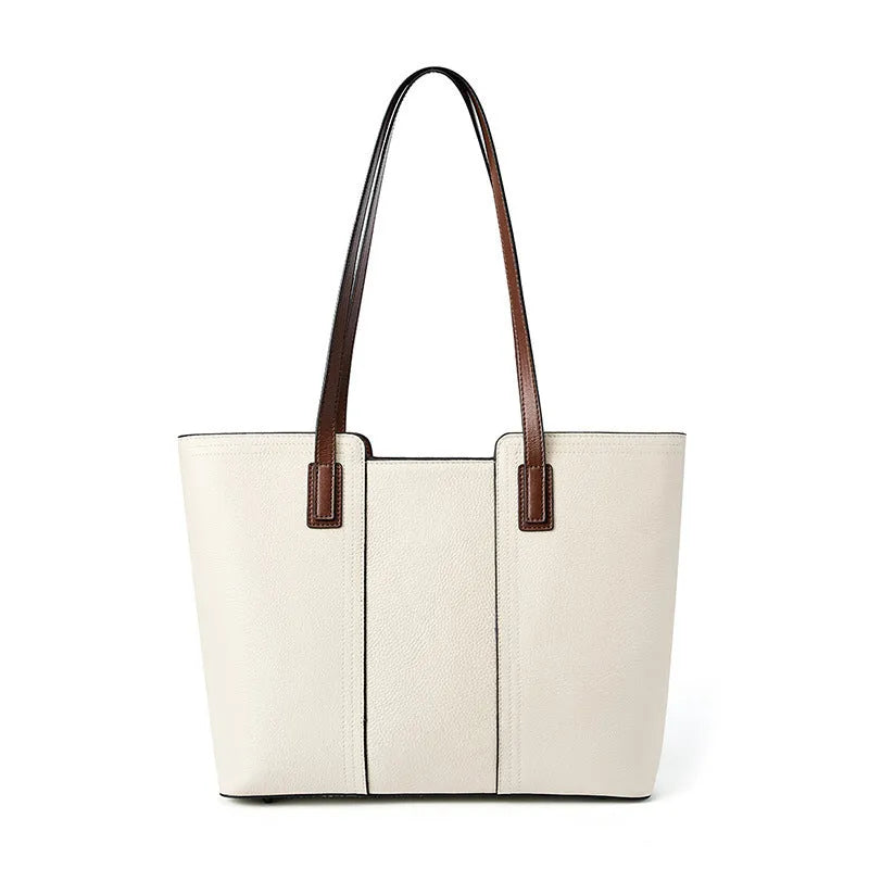 Women's black genuine leather horizontal square shoulder bag with crossbody strap showing internal organiser compartments.