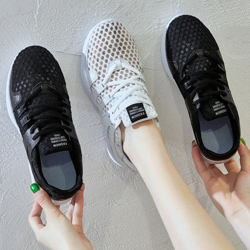 Men's black mesh casual sneakers with hollow breathable design and low-top cut