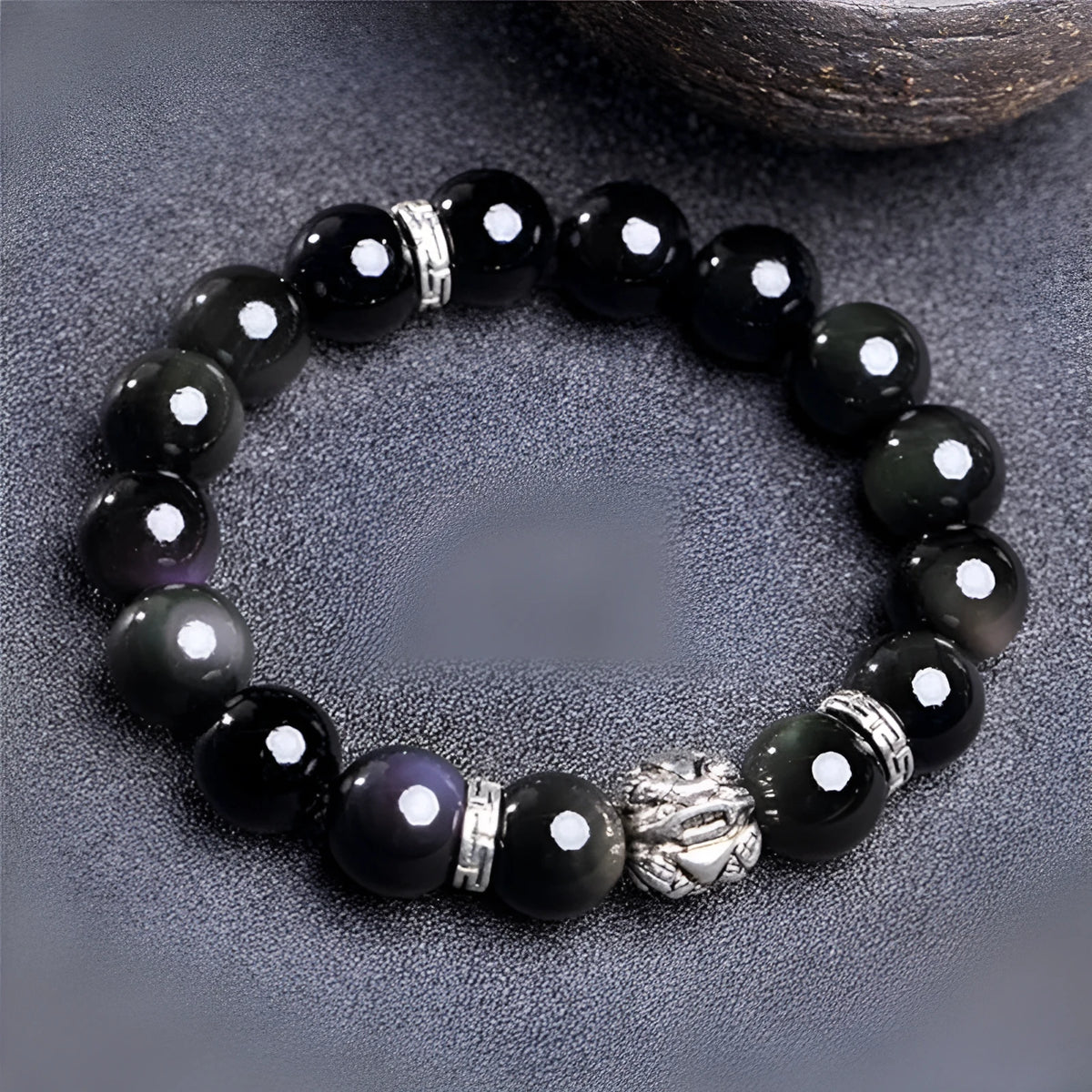 Natural obsidian stone bracelet with cloud pattern, showing 10mm and 12mm bead size options.