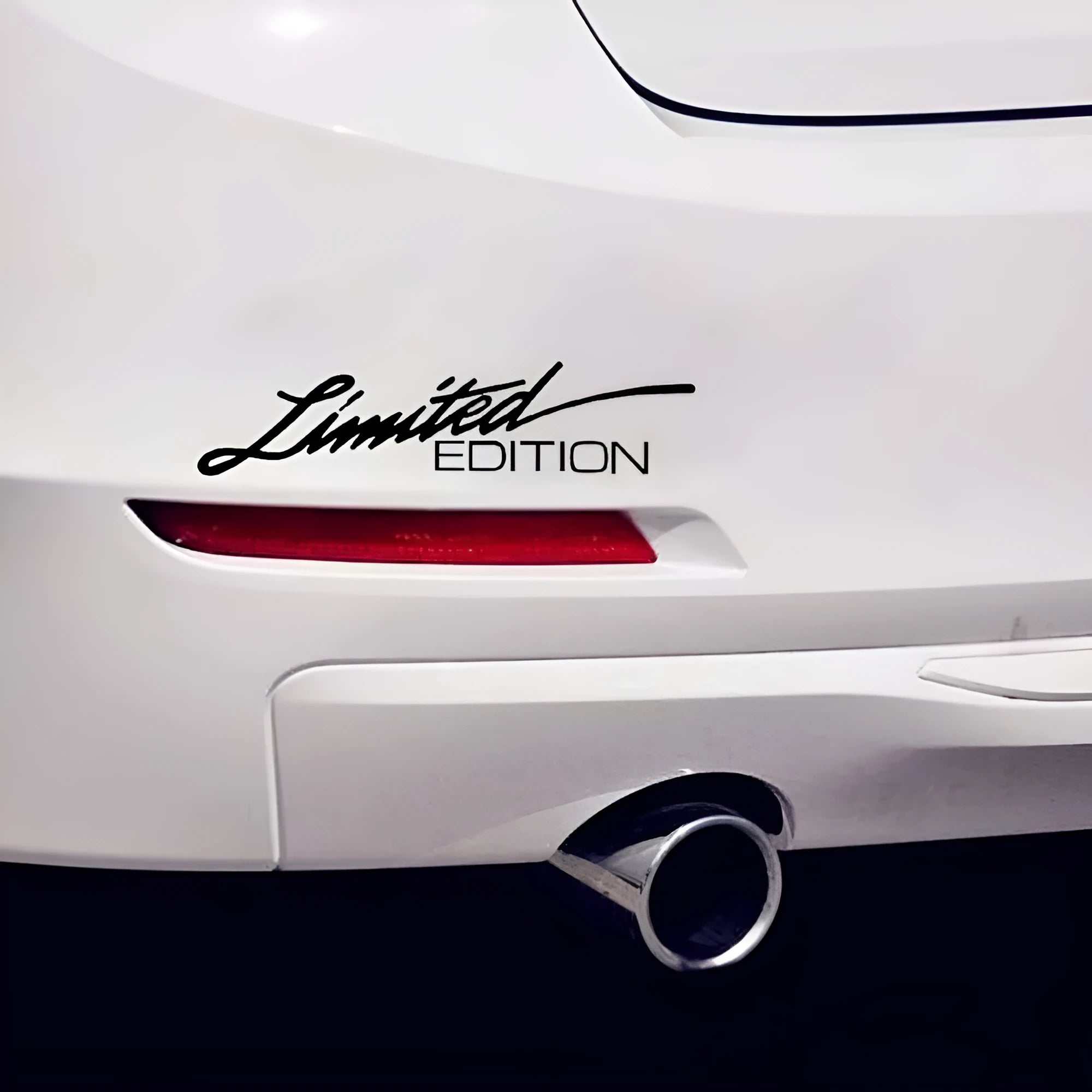 Reflective rectangular bumper sticker measuring 16cm by 3.8cm in black, white, and multi-colour options.