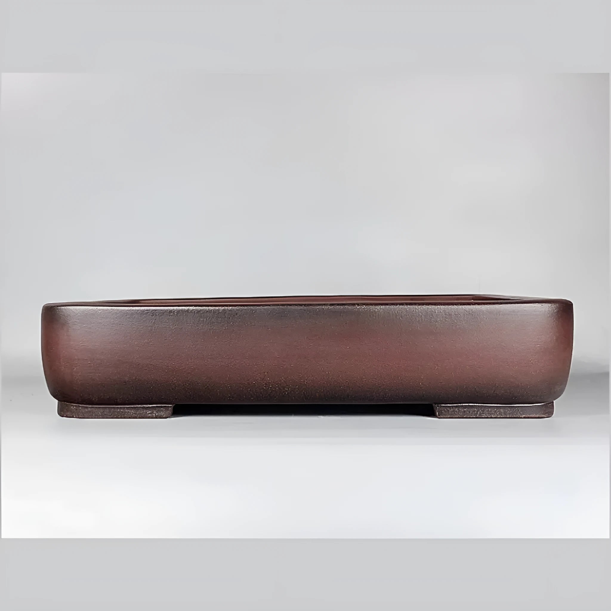Handmade antique rectangular purple clay flower pot showing traditional finish