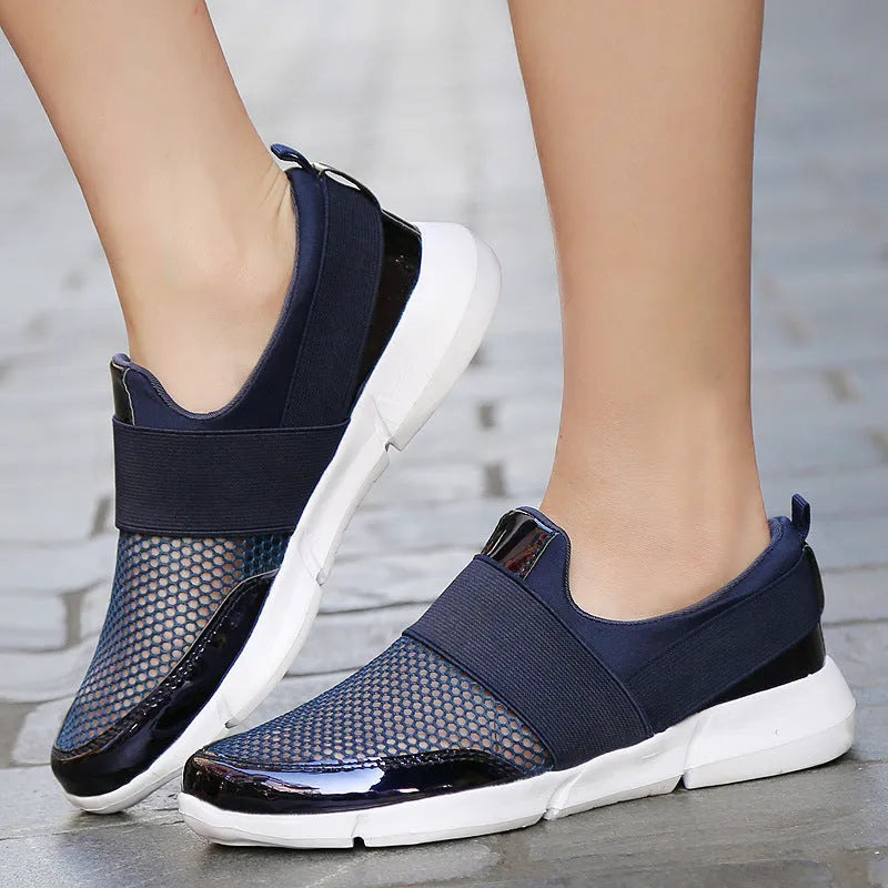 Women's low-top casual sneakers in blue with mesh interior and lightweight construction