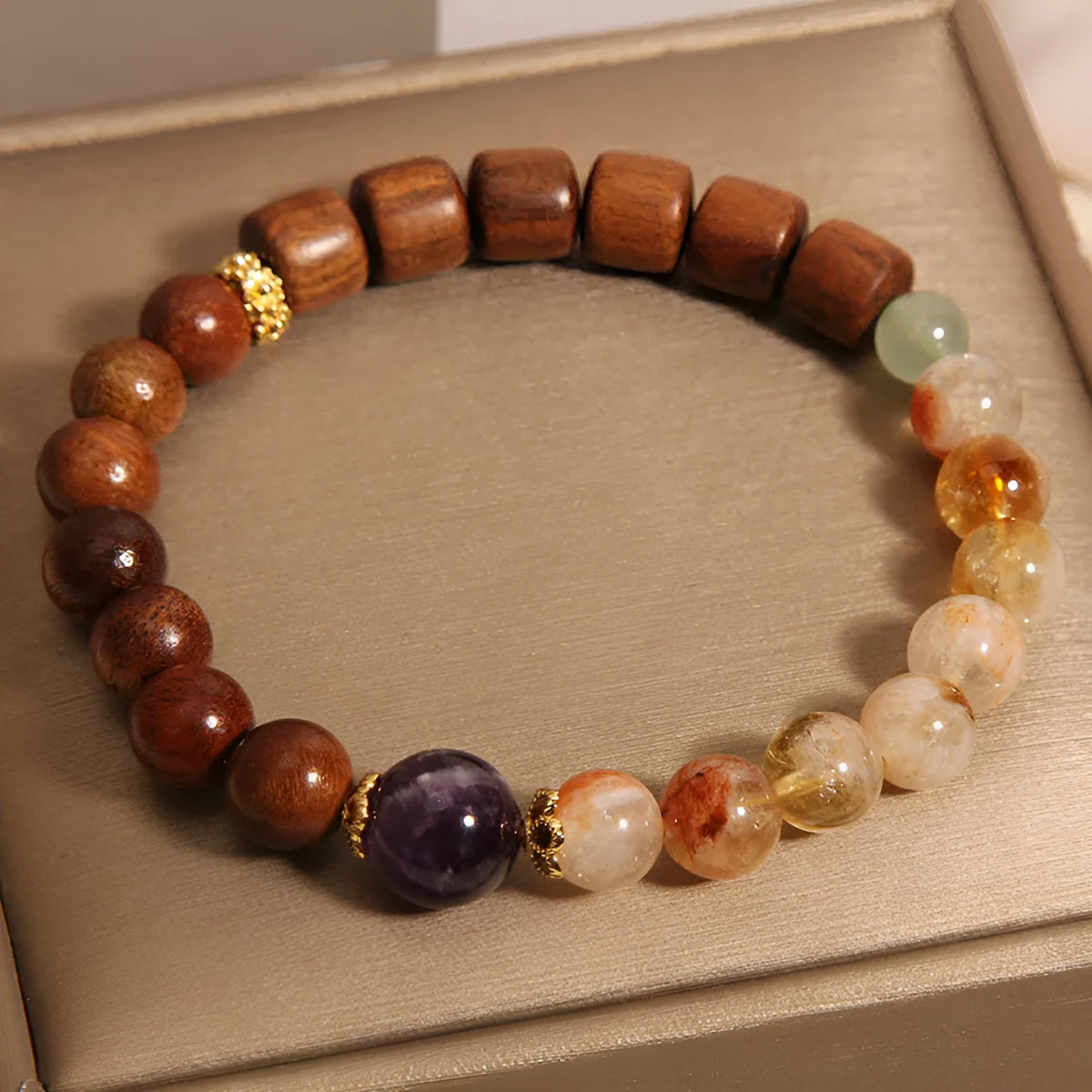 Women's bracelet with yellow tower crystal, ebony amethyst beads, pearl and rhinestone accents