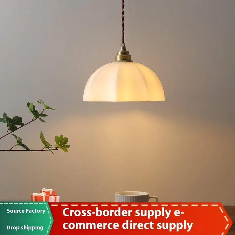 Brass Chinese style droplight with copper glass shade for bedside or dining room