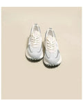 Women's grey and pink retro sneakers with low top design and rubber sole