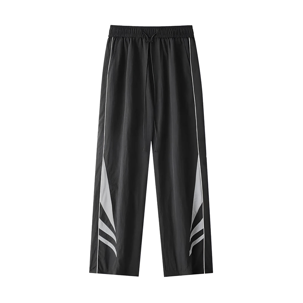 Men's straight-leg loose fit sports trousers in grey fabric with an elasticated waistband.