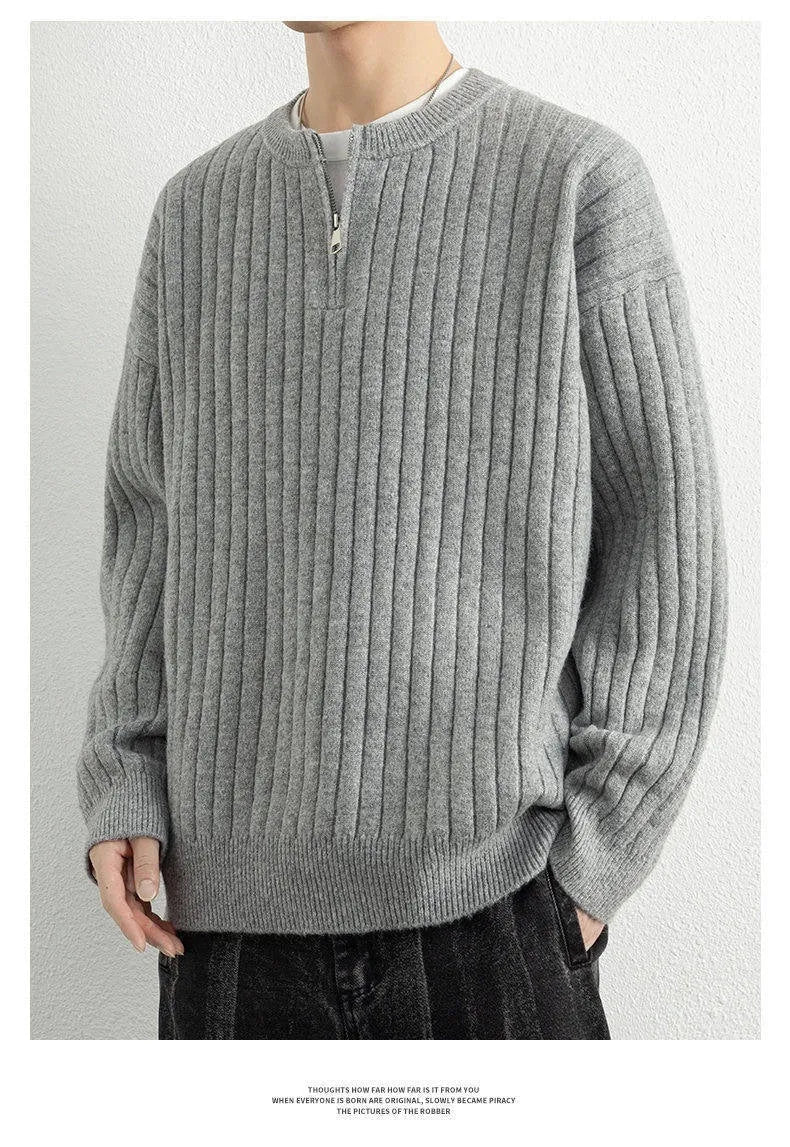 Men's grey half zip sweater with loose fit and textured knitted design