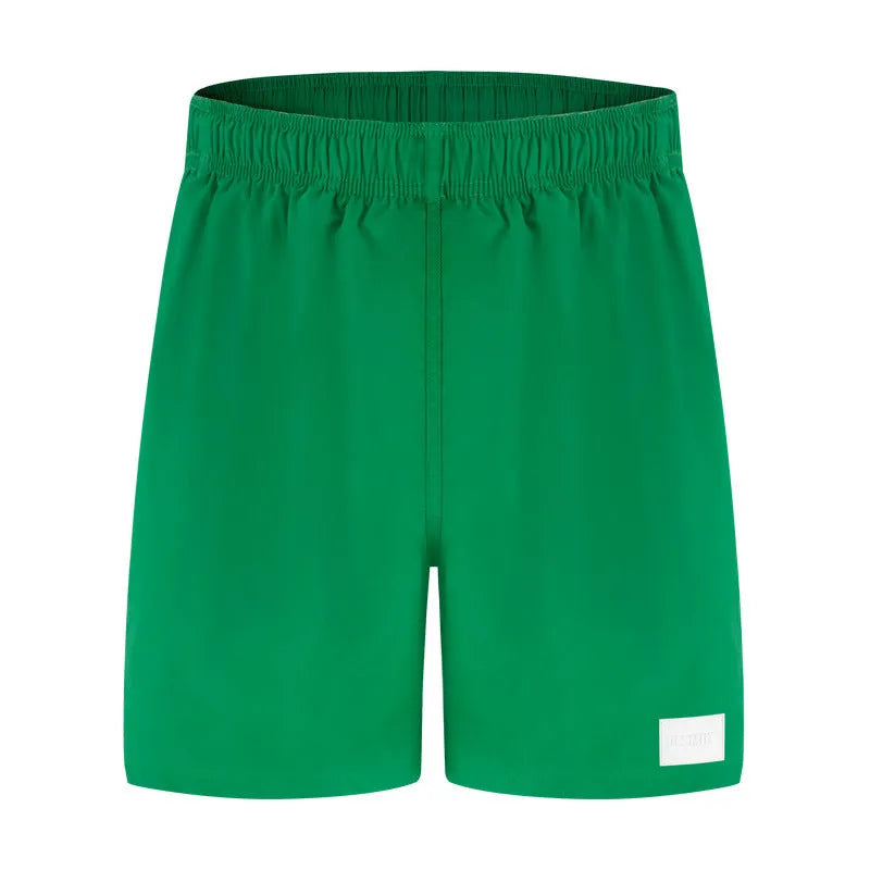 Men's quick-drying nylon sports shorts in blue with straight leg openings