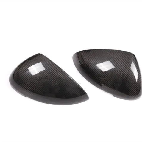 Pair of black true carbon fibre rearview mirror covers for Porsche Macan 2014-2022 models.