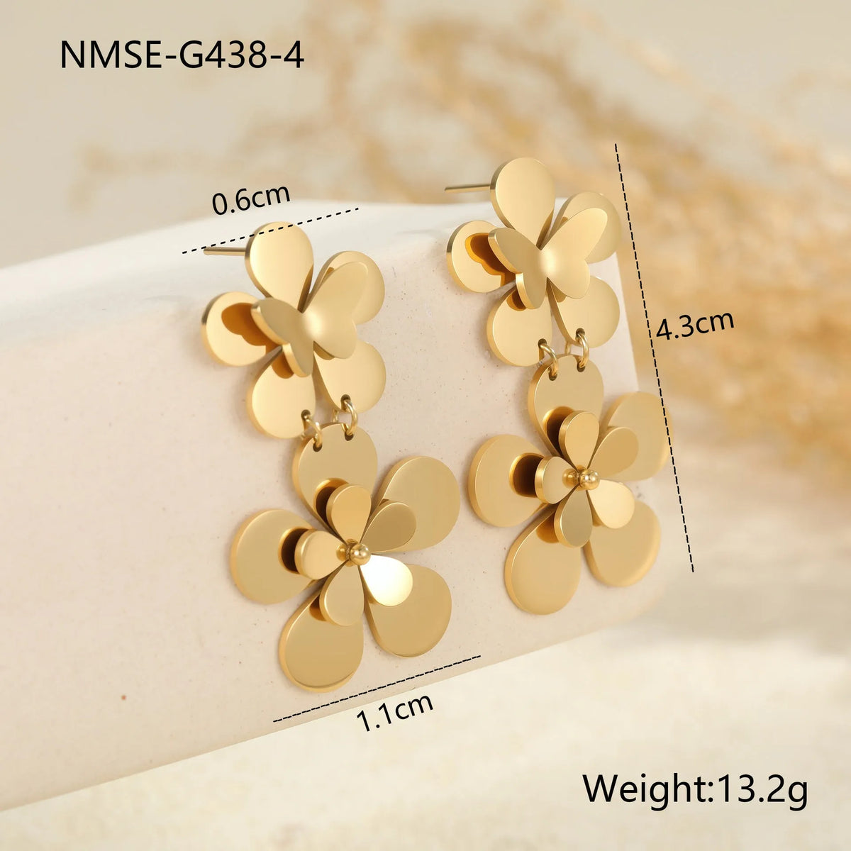 Gold-coloured stainless steel earrings with floral and butterfly design for women