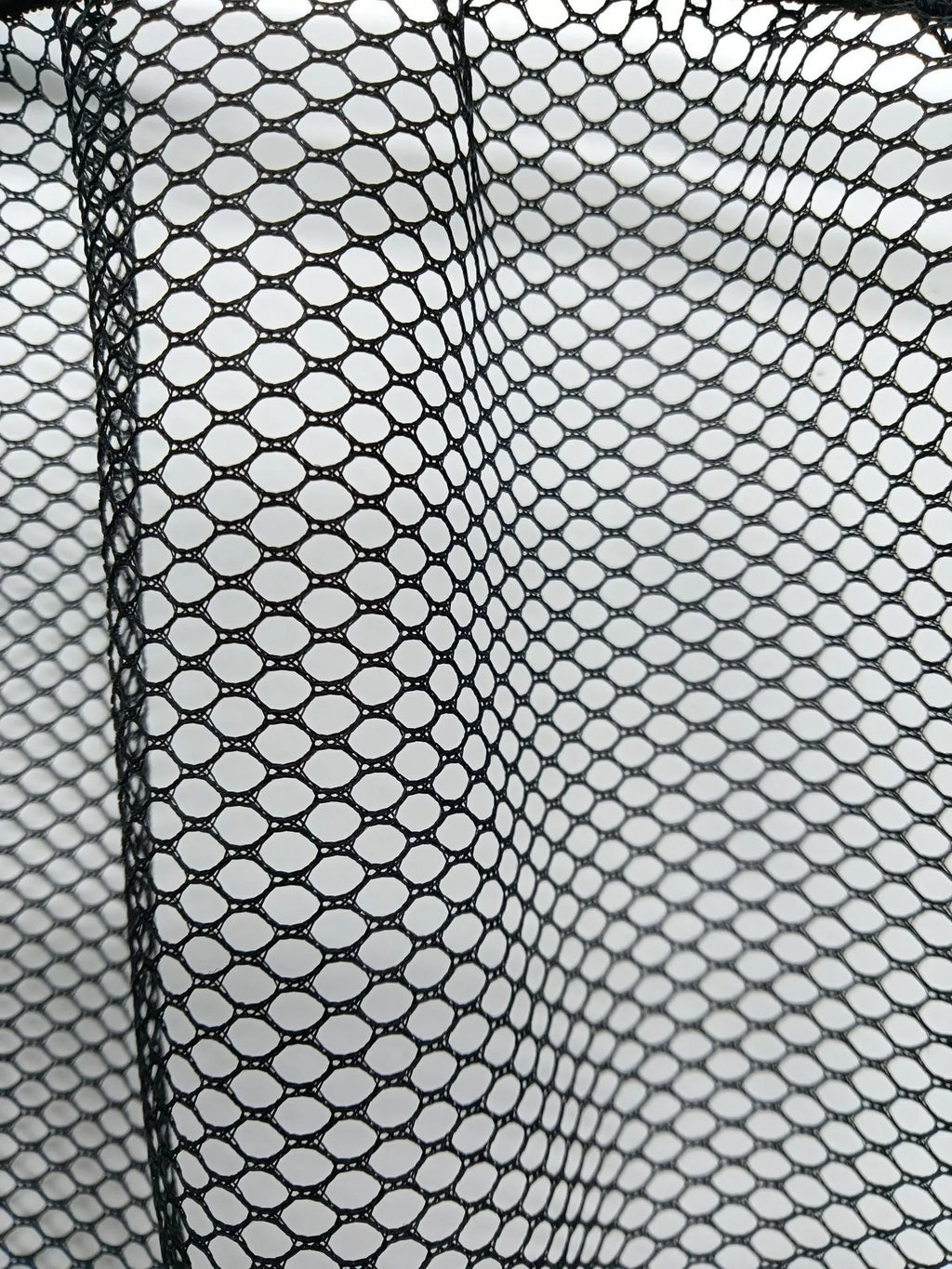 Grey elastic polyester car trunk storage net organiser in two size options.
