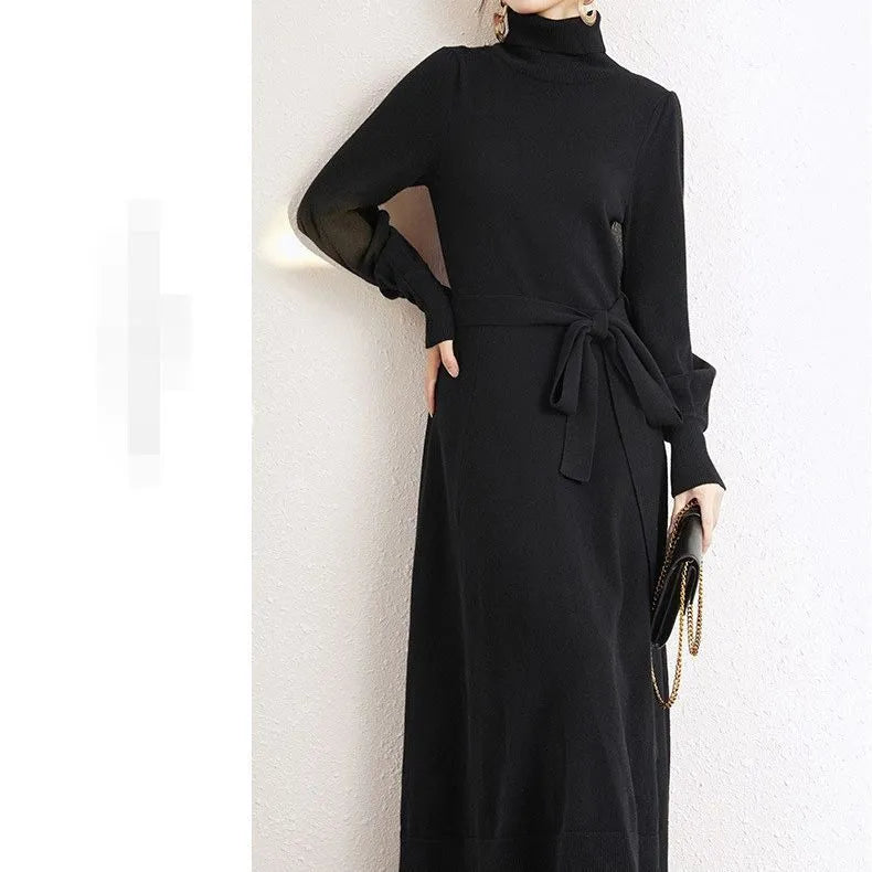 Turtleneck knit dress with elastic waist and loose hem in polyester fabric, shown in solid colour options