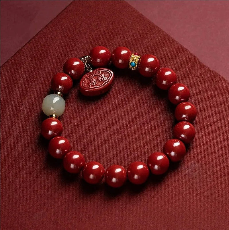 Natural cinnabar bracelet with emperor sandstone Ping An Fu Lu design, shown in 8mm and 10mm bead size options.