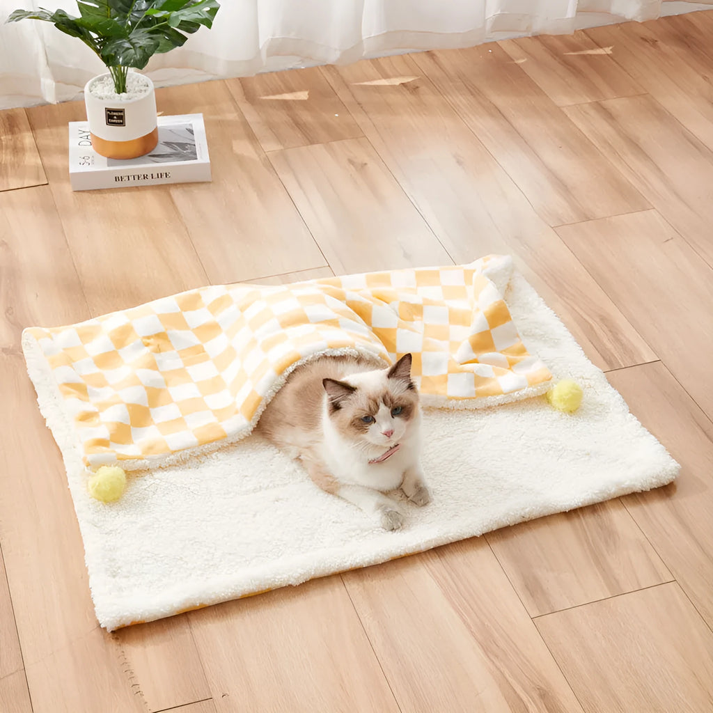 Plaid pattern pet blanket with fur ball decoration in green, pink, or yellow colours